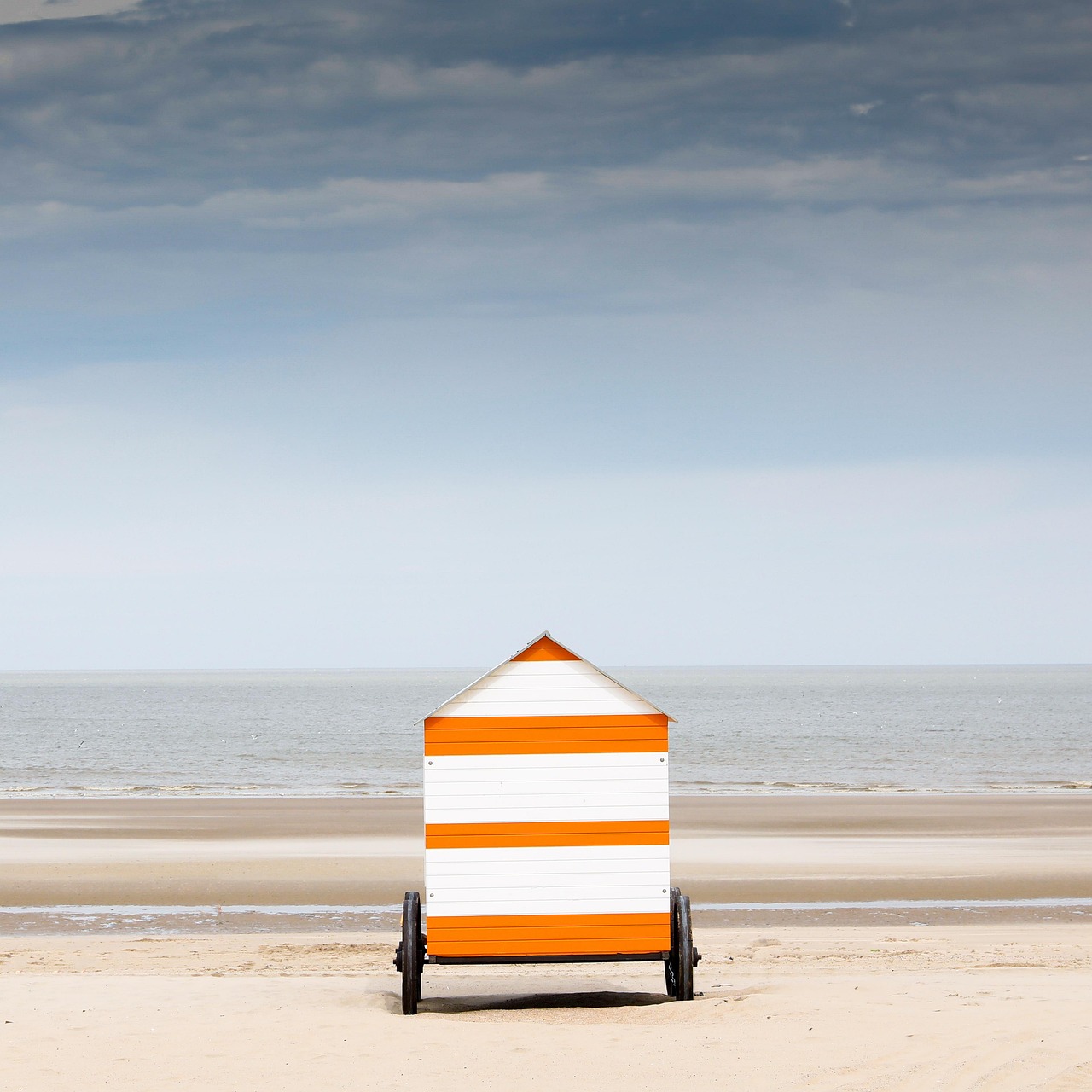 A small kiosk standing in an open landscape